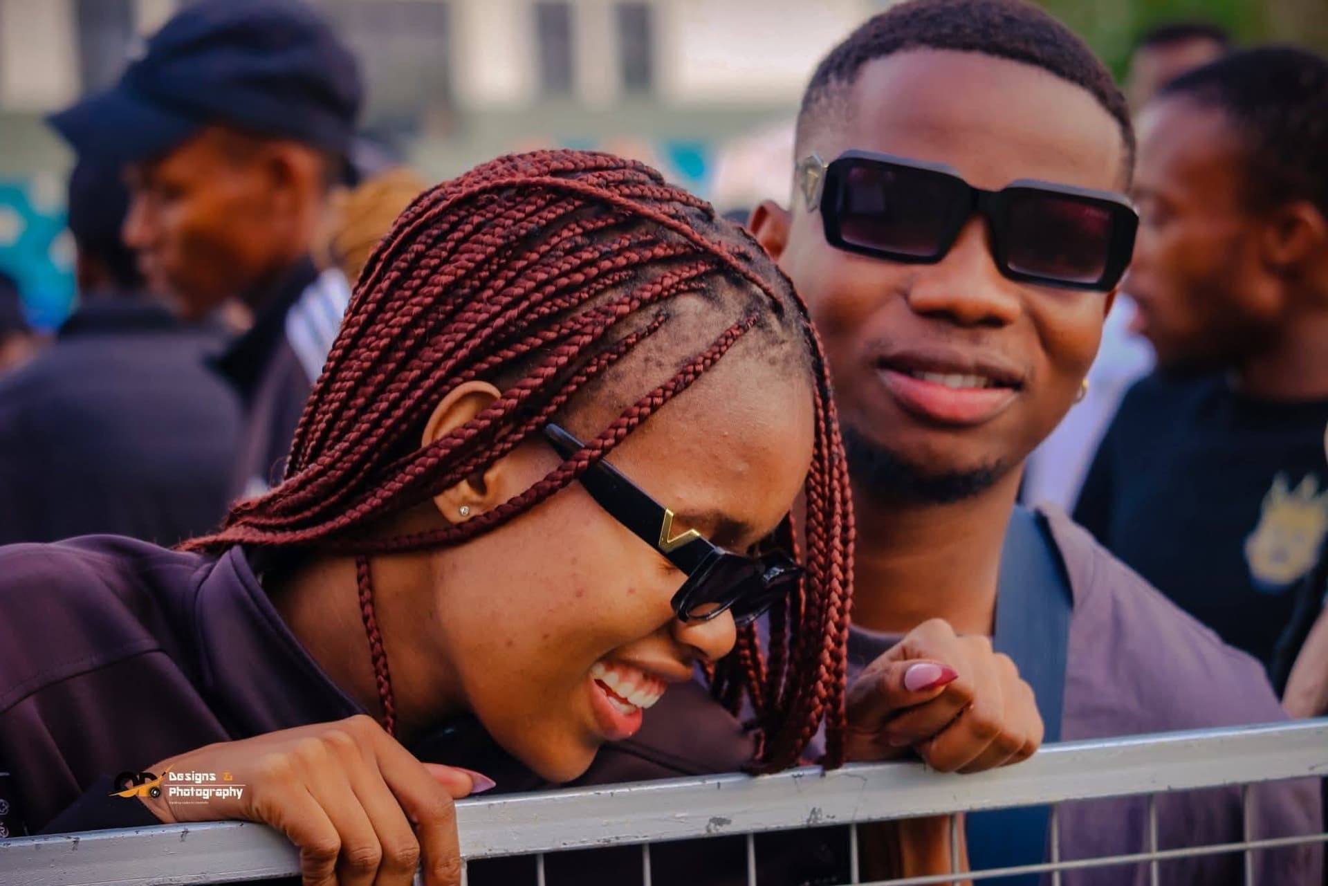 Fashionable attendees at the front of a Simply Piano crowd