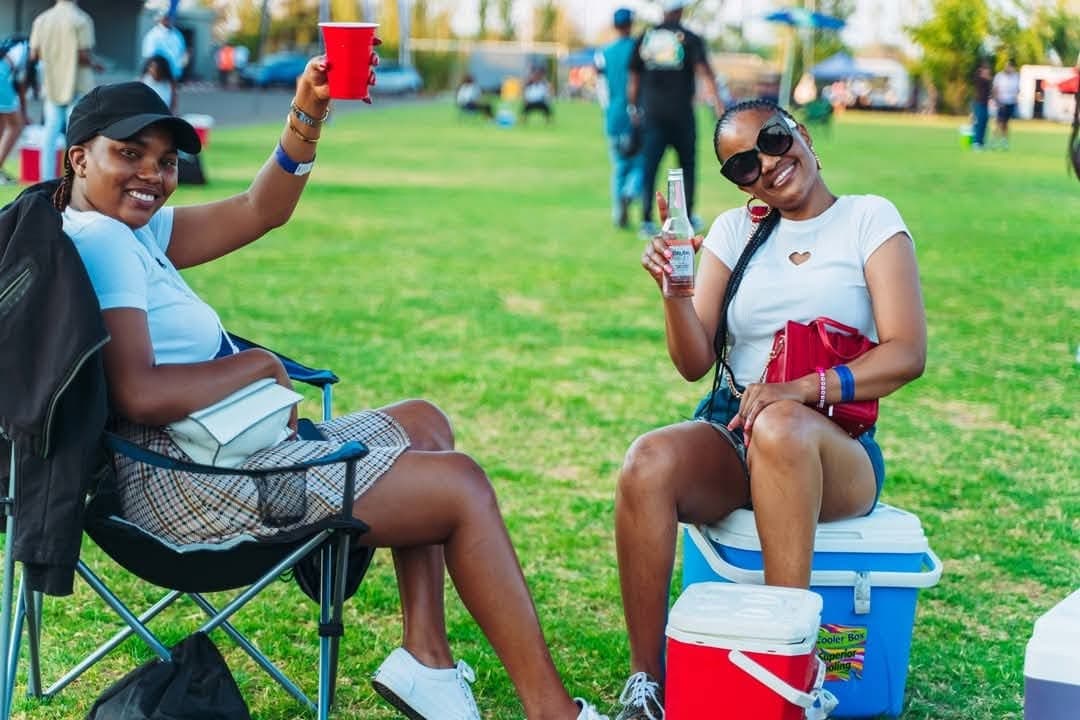 Attendees relaxing on camp chairs during a Simply Piano afternoon